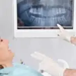 woman getting dental x-rays